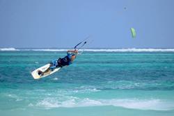 Kenya - Diani Beach. Windsurf, kiteusrf, surf and SUP. Kitesurf action.